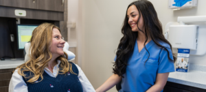 A Dental Associate tending to a Sincere Smile dental patient.