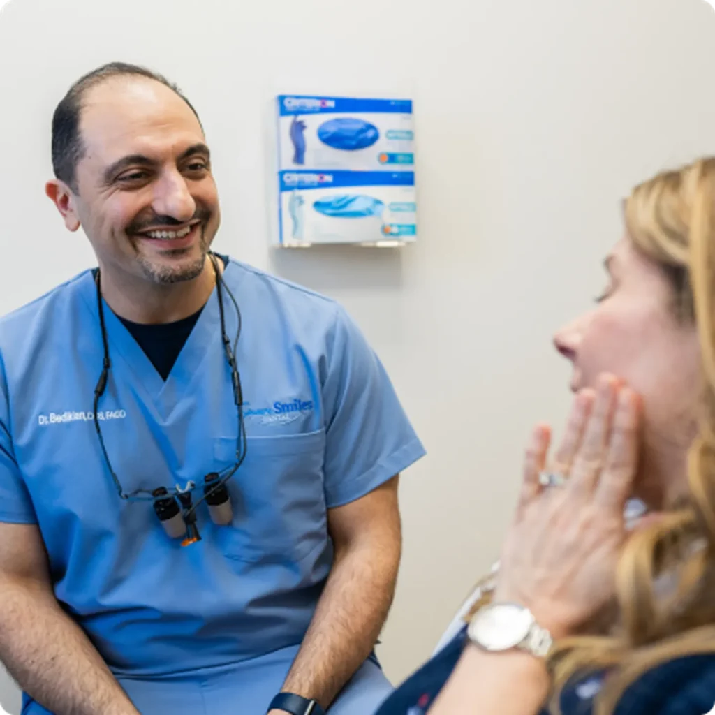 Dr. Bedikian speaking with a patient